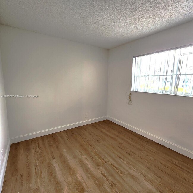 Building Photo - 8550 N Sherman Cir
