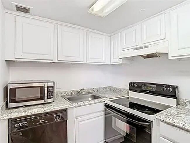 Building Photo - 2BR Condo Near UCF – All-Inclusive Living & Resort Amenities!