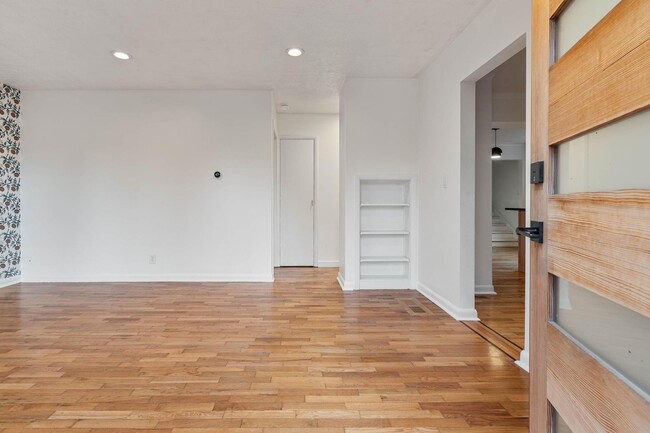 Building Photo - Beautiful, modern 4-bdrm/2-bath home in Concordia—Private, urban sanctuary w/ flex spaces