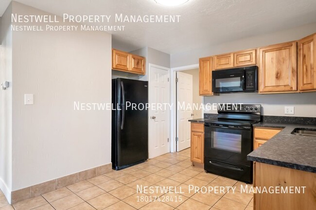 Building Photo - FREE 1ST MONTH'S RENT - Remodeled 2-bed Un...