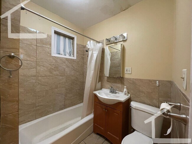 Building Photo - 9/1 Oversized Allston 4BR/2BA w/heat inc