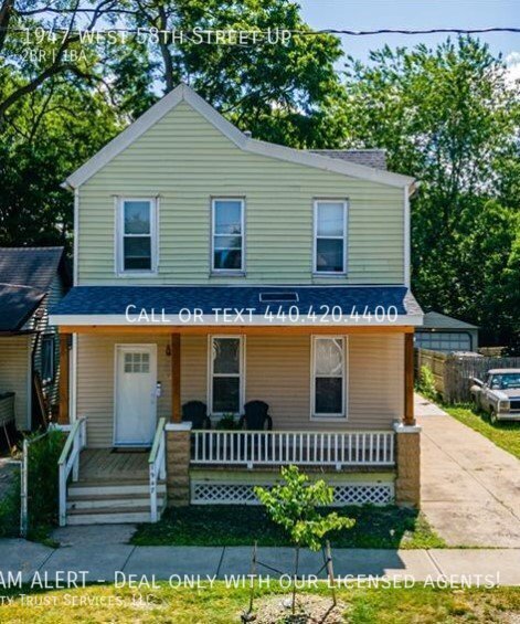 Primary Photo - Charming 2-Bedroom Up Unit with Terrace in...