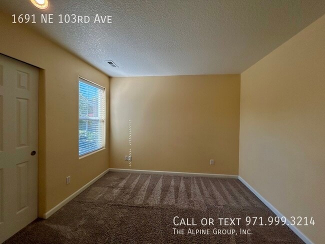 Building Photo - 1691 NE 103rd Ave