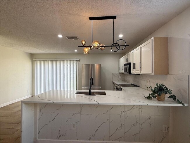 Building Photo - 10497 Sun Villa Blvd