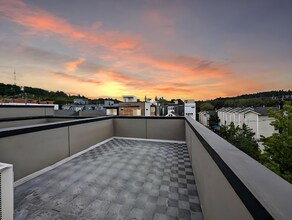 Building Photo - Stunning Two-Bedroom Townhome with Rooftop...