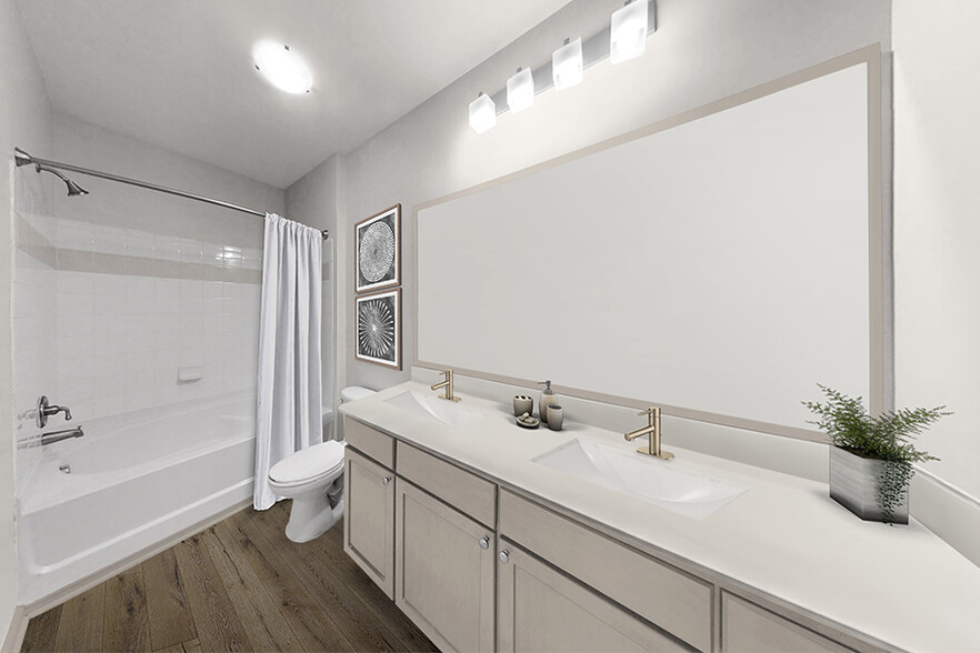 Upgraded bathrooms with framed mirrors - Chancery Village