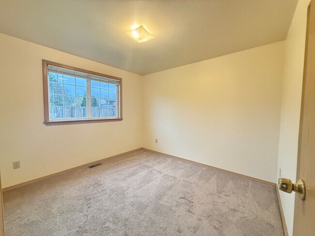 Building Photo - Sunny Rambler on Corner Lot with Large Fenced Yard & Deck