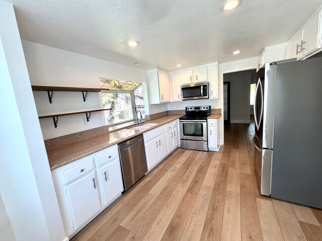 Building Photo - Welcome Home to Prestigious North Upland Living