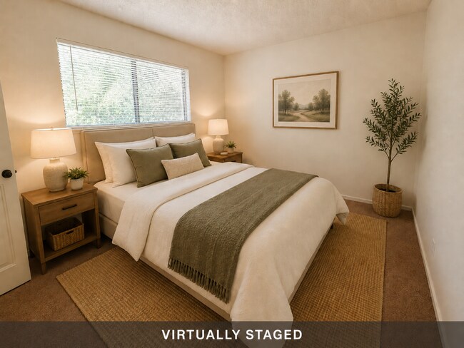 Building Photo - Updated 2 bedroom 1 bath condo in a quiet park like setting with a community pool