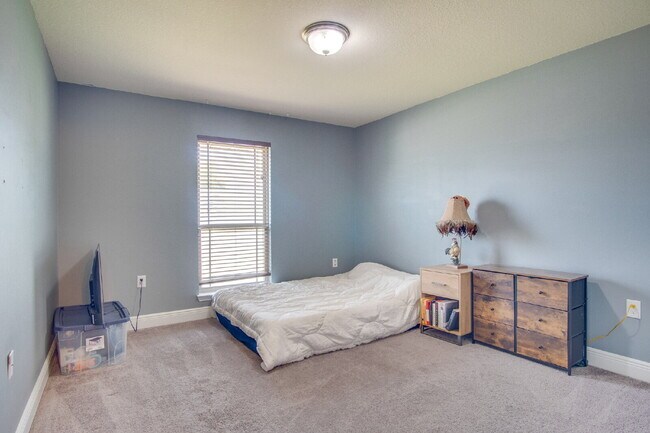 Building Photo - Milton 4BR Pool Home with Office, Vaulted Ceilings, Screened Saltwater Pool & 2-Car Garage