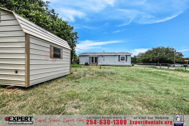 Building Photo - A cozy 3-bedroom, 2-bathroom home nestled ...