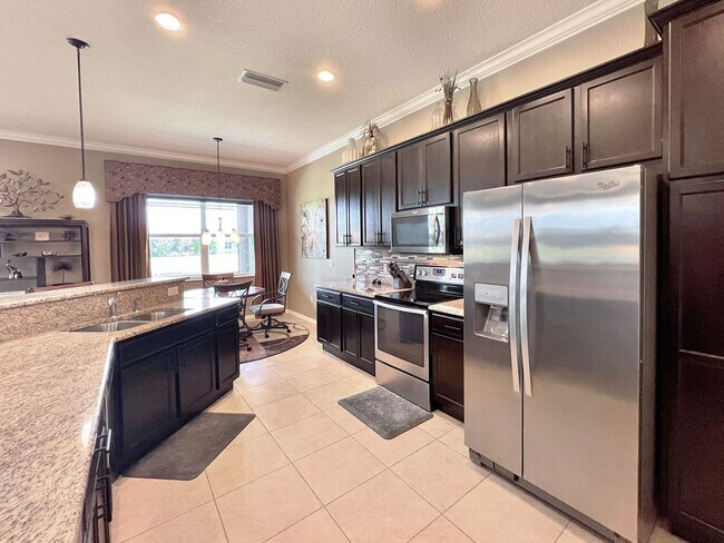 Building Photo - Three-Bedroom Furnished Home in 55+ Lake Ashton Community