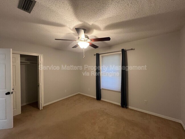 Building Photo - 6004 Players Pl