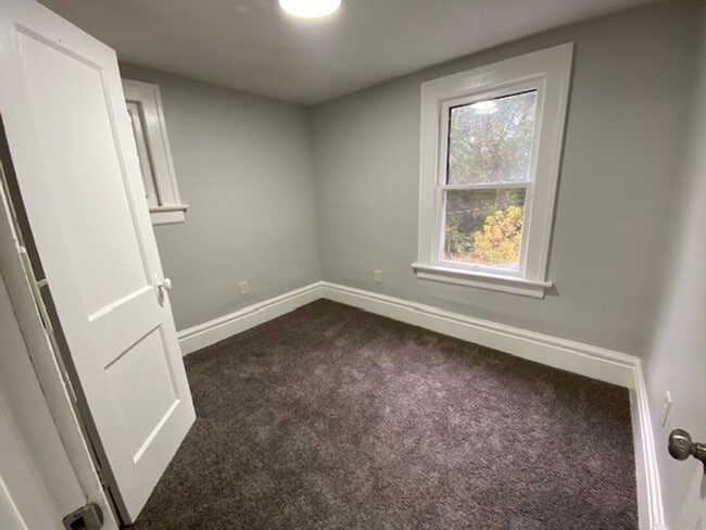 Building Photo - Updated 5-Bed, 2-Bath with Attic Suite & Clean Basement