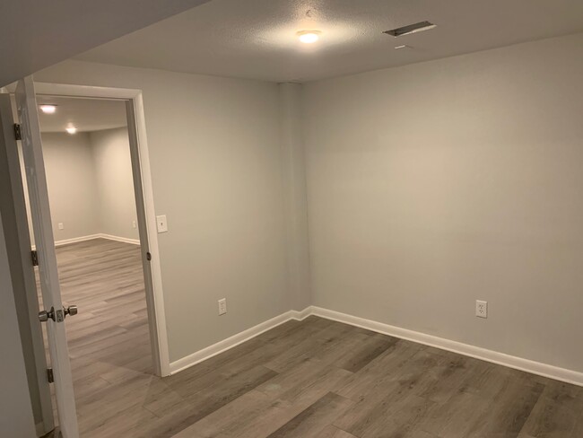 Bed 4/living room in basement - 13613 E Nevada Pl