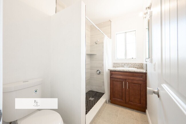 Building Photo - Prime Location Apartment with Remodeled Ki...