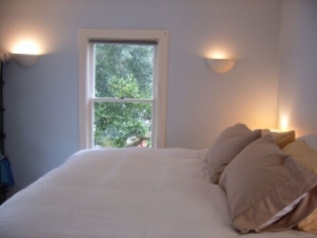 16. Master bedroom with French doors to Right of bed- others put bed on opposite wall - 680 Highland St