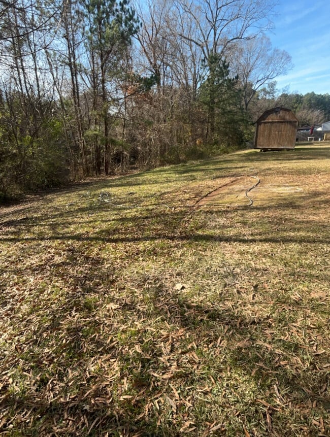 Building Photo - Cozy 3BR SFR • Full Kitchen Set • Patio in Durham