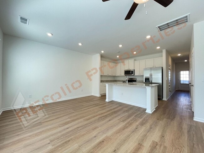 Building Photo - Move In by April 30 & Save $200/Month! Townhome Only $1,695! Regular $1,950 — Available NOW