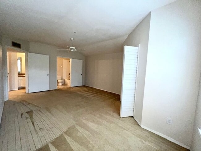 Building Photo - Move in NOW- Spacious 2 bedroom 1 bath condo on 3rd floor in gated community! Water included with...