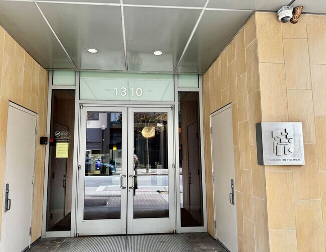 Building Photo - Corner Light. City Energy. Zero Compromise.