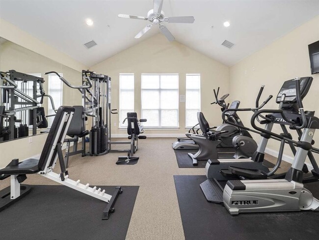 Building Photo - Spacious top-floor condo — 2BR/2BA with hardwood floors, electric fireplace & deposit-free move-i...