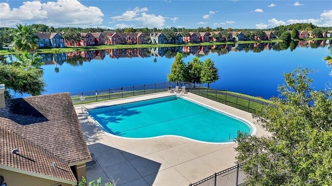 Building Photo - 9834 Lake Chase Island Way