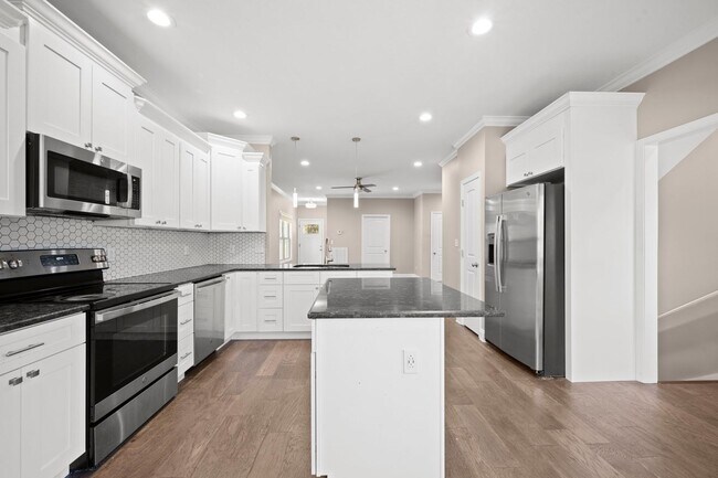 Building Photo - Move-In Special Available! Beautiful 4BR Home with Finished Basement