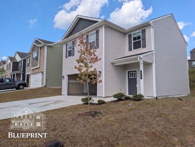 Building Photo - 2024 build, great neighborhood, stainless appliances, granite countertops!