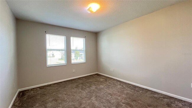 Building Photo - 16466 Glassy Loch Loop