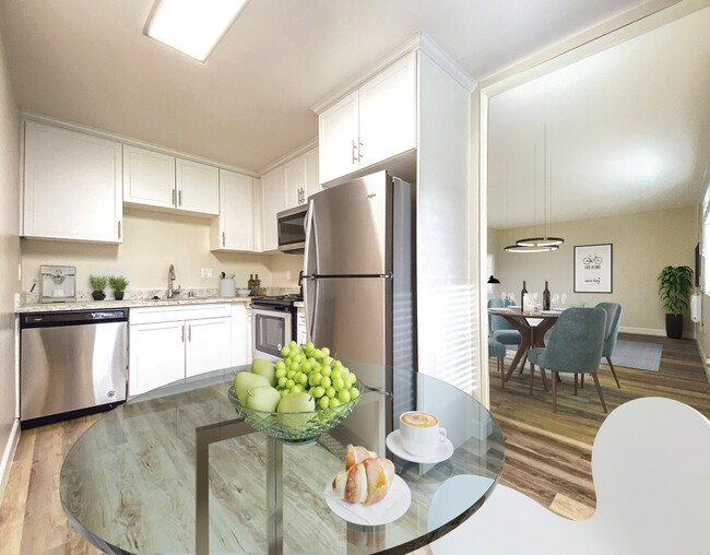 Kitchen and dining area at Pleasanton Heights Apartment Homes - Pleasanton Heights