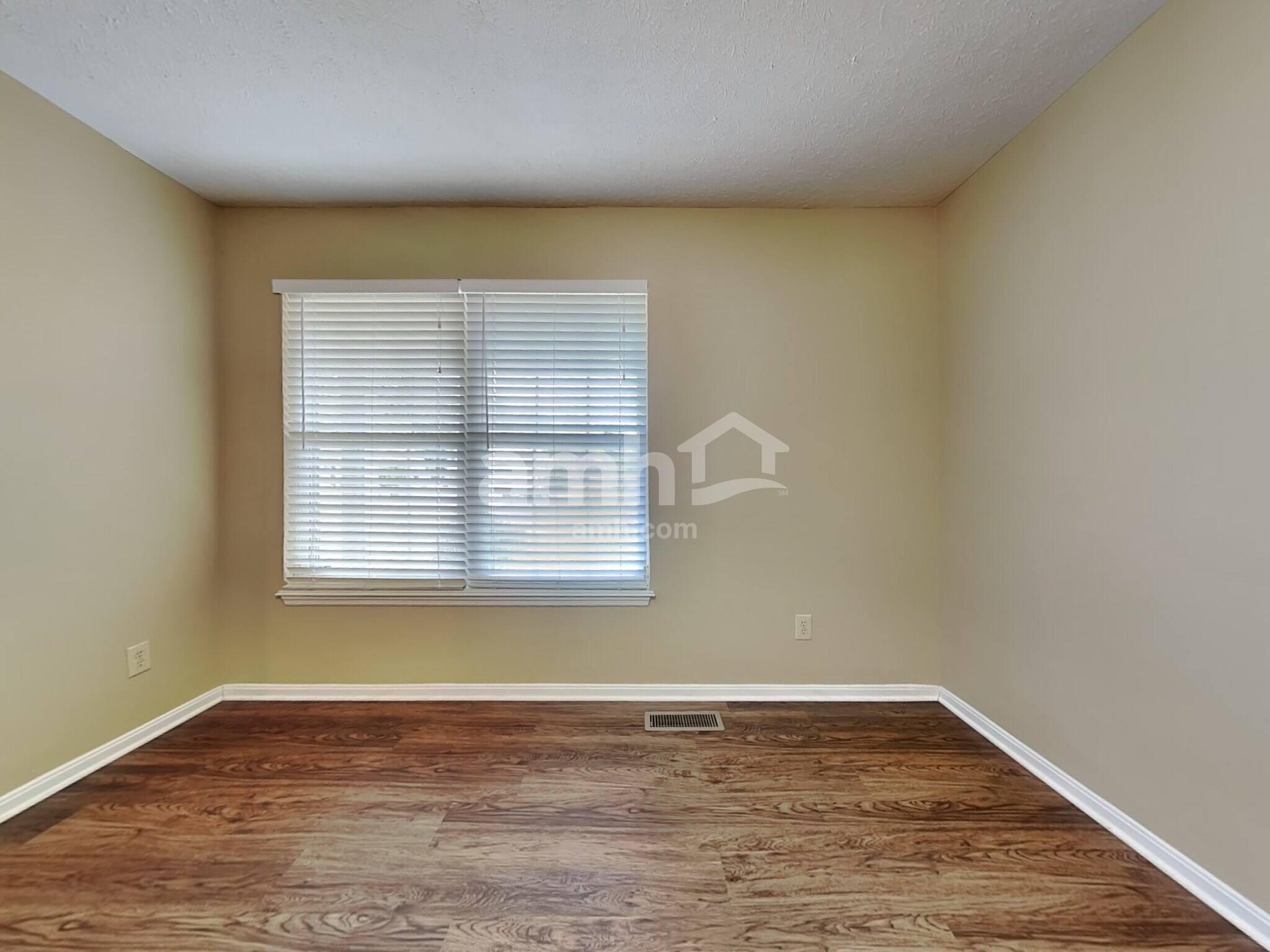 Building Photo - 8676 Woolstone Ct