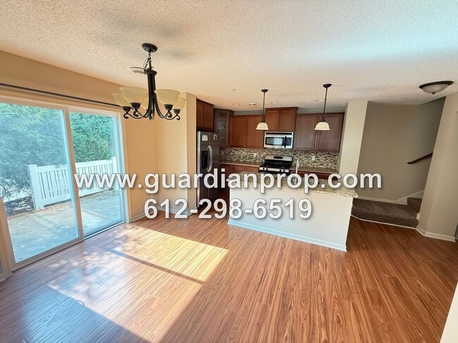 Building Photo - End Unit Townhouse Available Now, Loft Area, Large Primary Suite, Private Side Patio