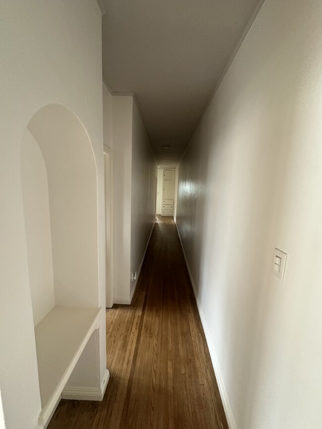 1618 long hallway prime for art and a classic “phone” cutout - 1618 Hauser Boulevard