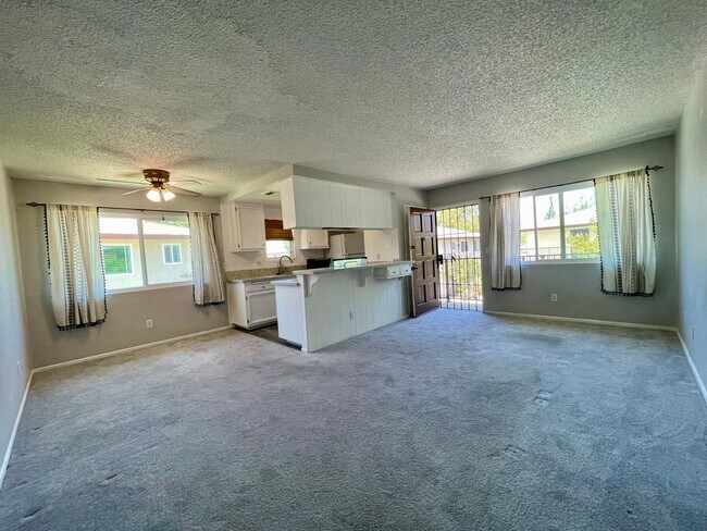 Building Photo - 2 bedrooms, 1 bath with carport Home is Close to the 52, 67 and 125 freeways, shopping and restau...