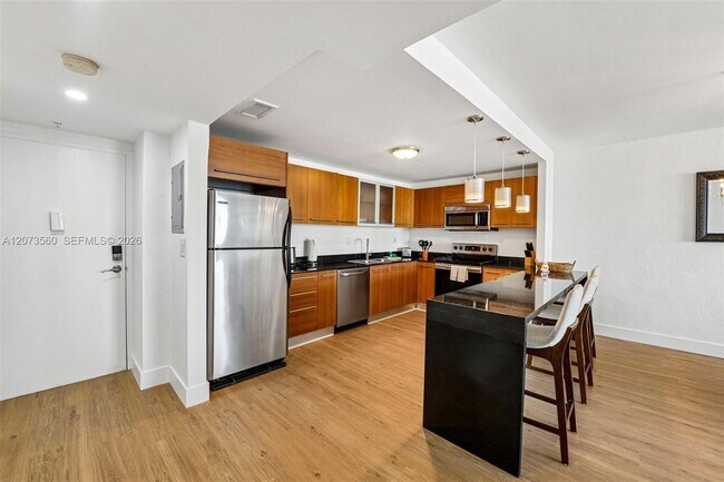Building Photo - 19370 Collins Ave