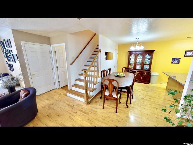 Entry facing toward dining and stairs - 282 W 960 S Apt A