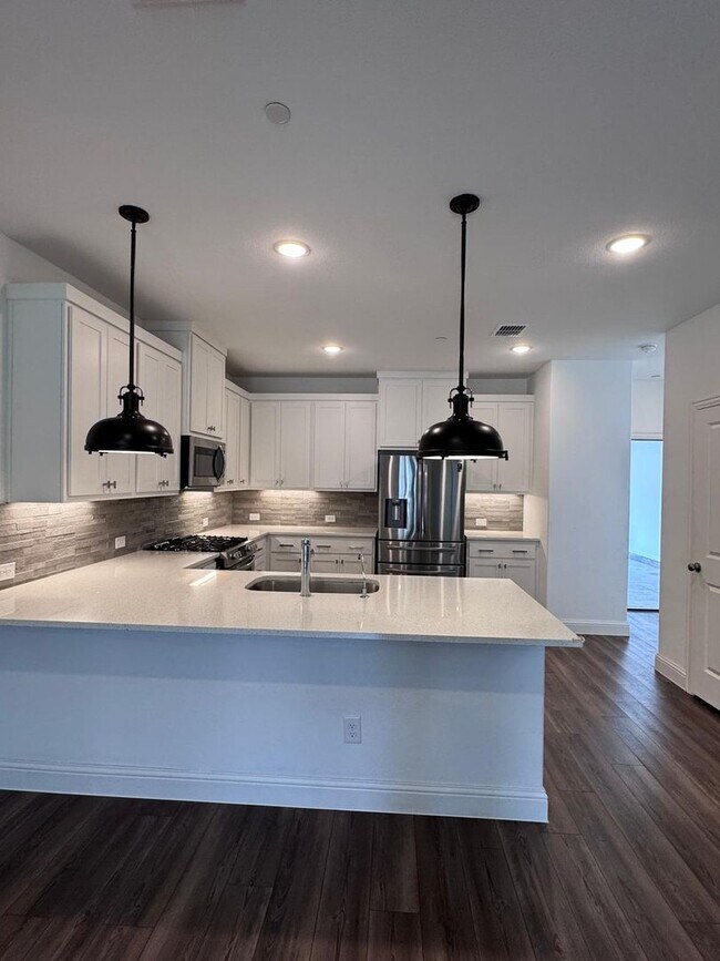 Building Photo - FULLY UPGRADED LUXURY TOWNHOME located in ...