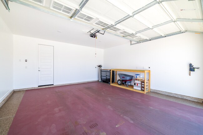 2-car garage with EV charge port - 8924 W Solano Dr