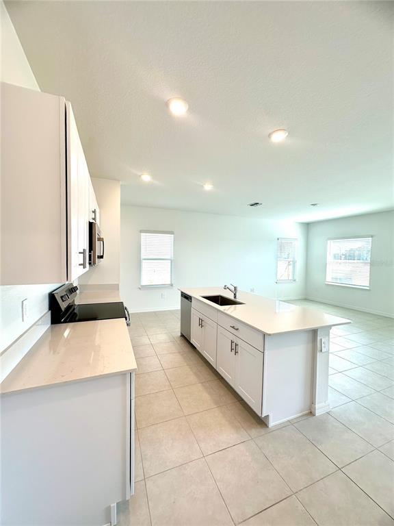 Building Photo - 8795 Coqui Song Ln