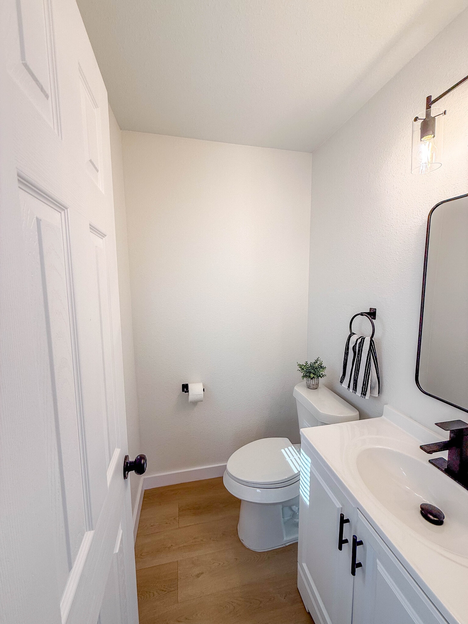 Half bath in primary bedroom - 308 E Bourn St