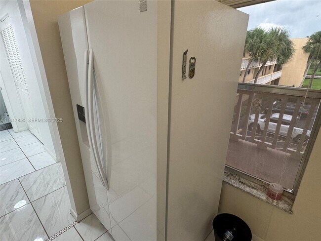 Building Photo - 6050 NW 64th Ave