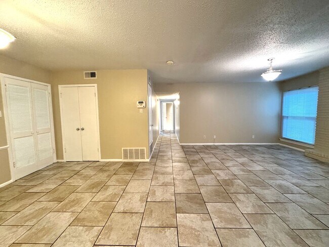 Building Photo - Single-level living on ground floor  |  Fresh paint (July 2026)  |  2 carports  |  Community Pool...
