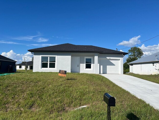 Building Photo - BRAND NEW 2/2/1- SW LEHIGH ACRES