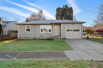 Building Photo - Cozy 2BR Corner Lot Home with Garage, Shed & Fenced Yard!