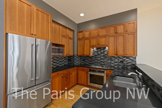 Building Photo - Exceptional 2 Story CapHill Condo * 2 Pkg Spaces, EV Charger & Rooftop Views