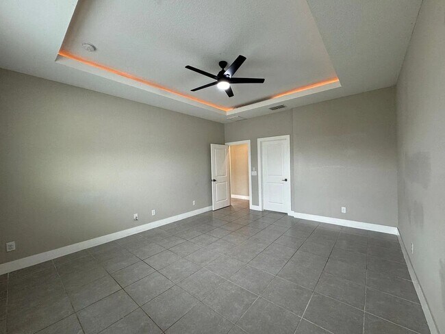 Building Photo - Beautiful New 3-Bedroom Home with Spacious Layout & 2-Car Garage in Poinciana Villages