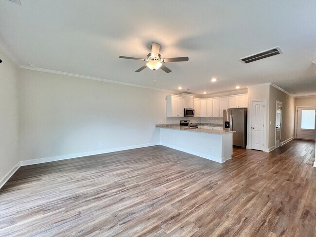 Building Photo - Stunning 3BD, 3BA End Unit Raleigh Townhome on a Corner Lot with High End Features in an HOA Comm...