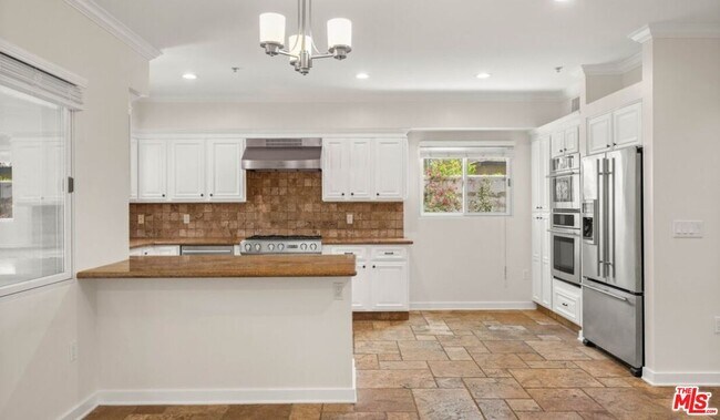 Building Photo - 10616 Kinnard Ave