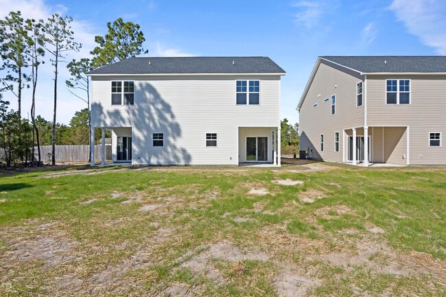 Building Photo - Townhome for Rent with Covered Patio!